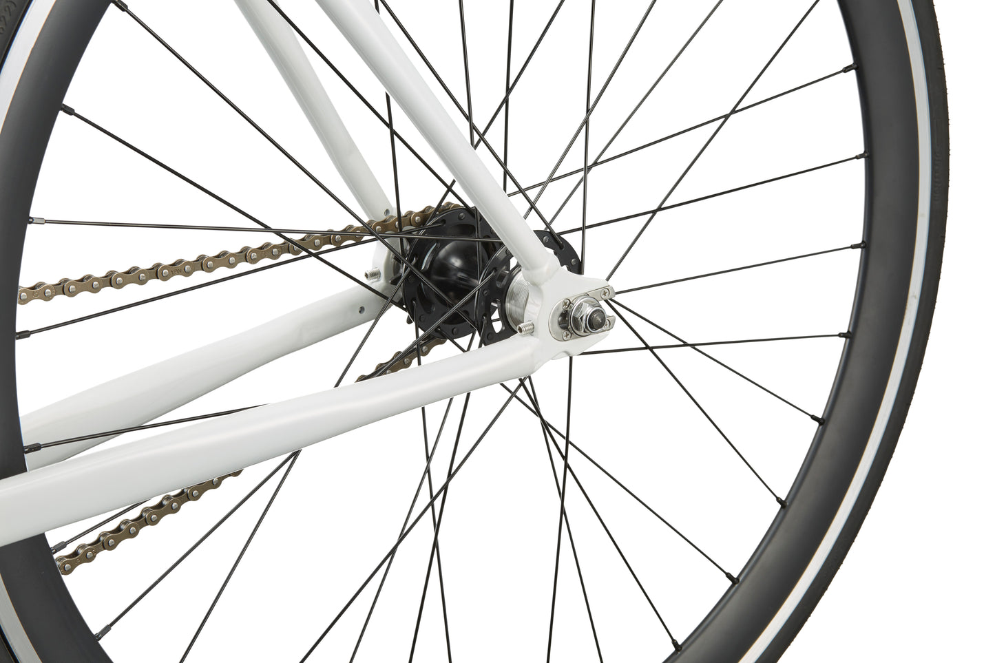 Close-up of the Coltello Geometry’s rear wheel, showcasing its minimalist design and white frame on a white background.