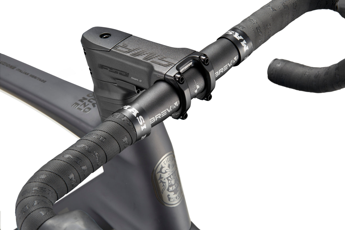 Close-up of a black EVOLUZIONE 1 handlebar with textured grips and BREAKR stem, highlighting its high-performance aerodynamic design.