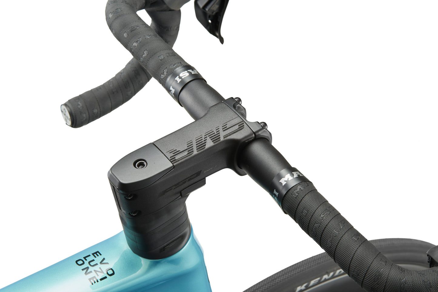 Close-up of EVOLUZIONE 1s handlebar and stem with black grips, digital controls, on an aerodynamic blue frame.