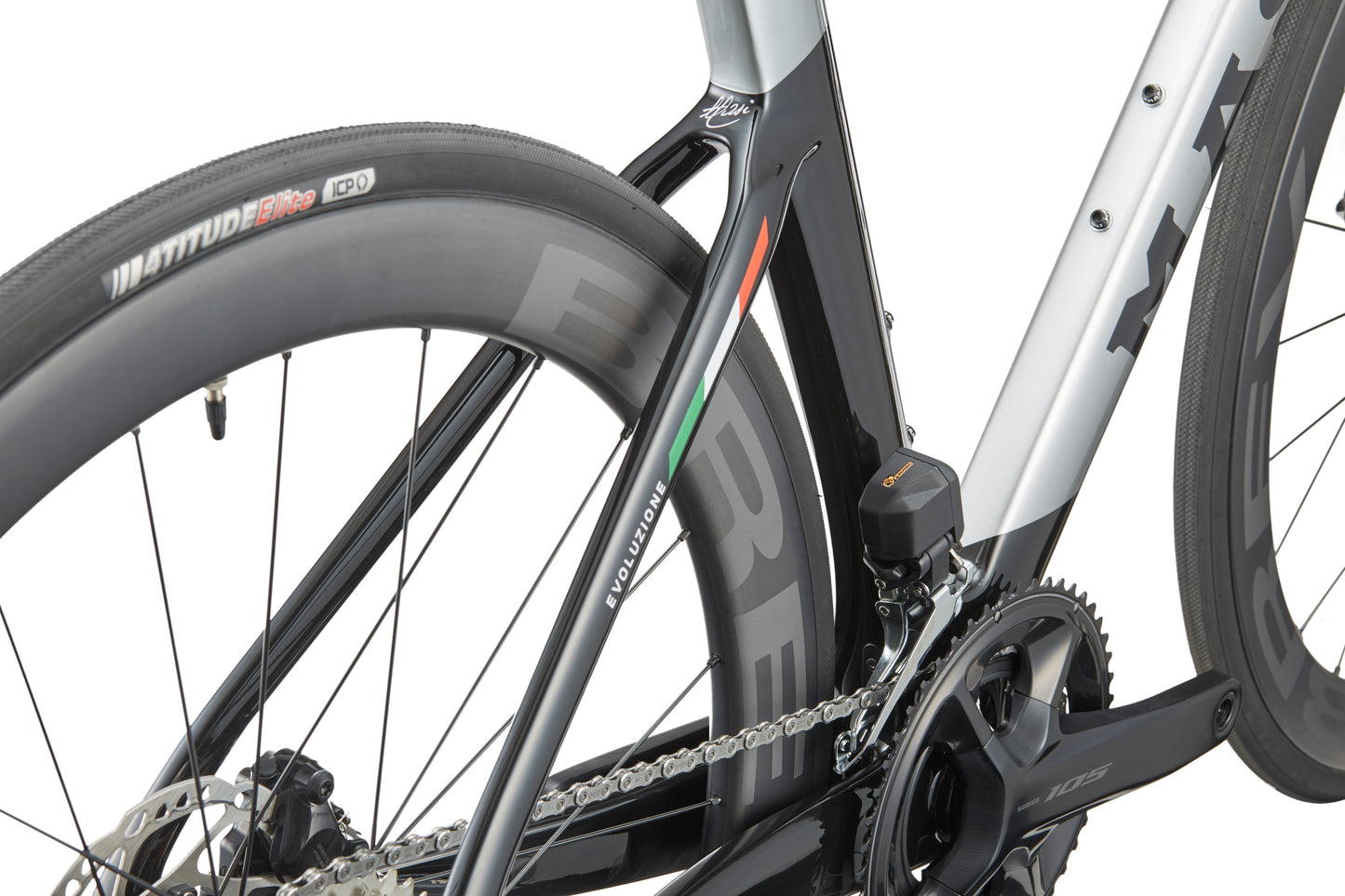 Close-up of the rear wheel and chain of a Masi EVOLUZIONE 1 showing its aerodynamic design with colorful stripes and branded components.