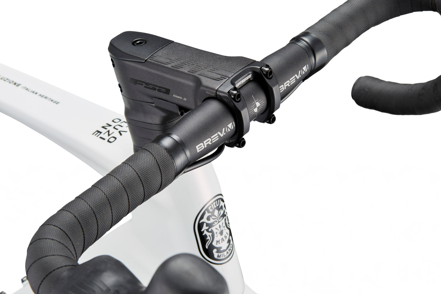 Close-up of EVOLUZIONE 1 handlebar with black grips and electronic display, on white frame featuring logo and text details.