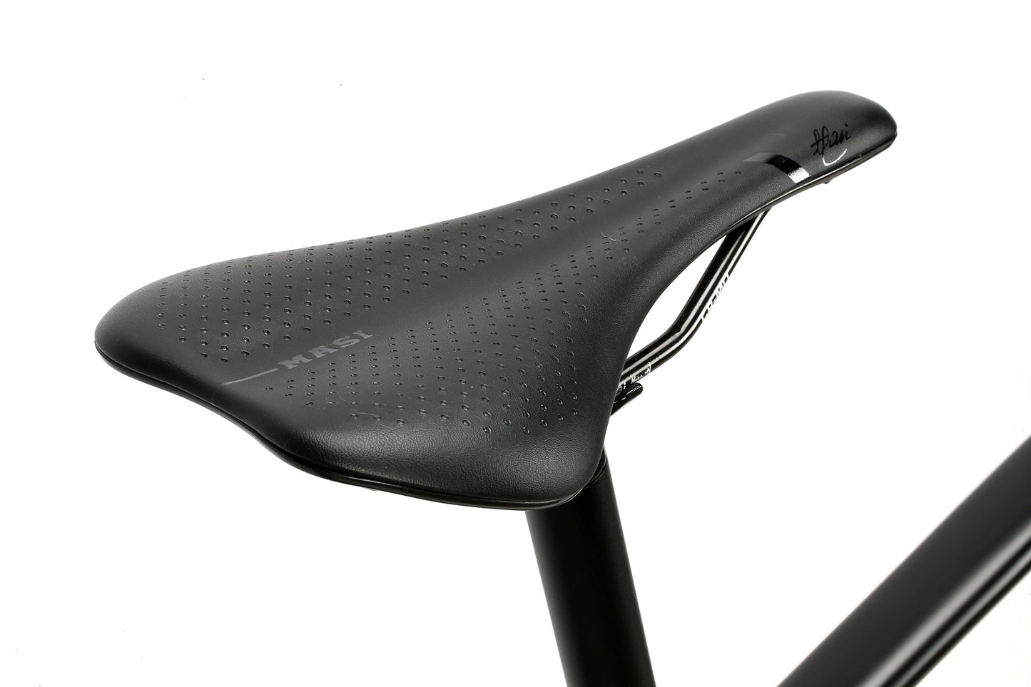 Close-up of the BRUNELLO FB NOVE black saddle with subtle perforations on an aluminum gravel frame.