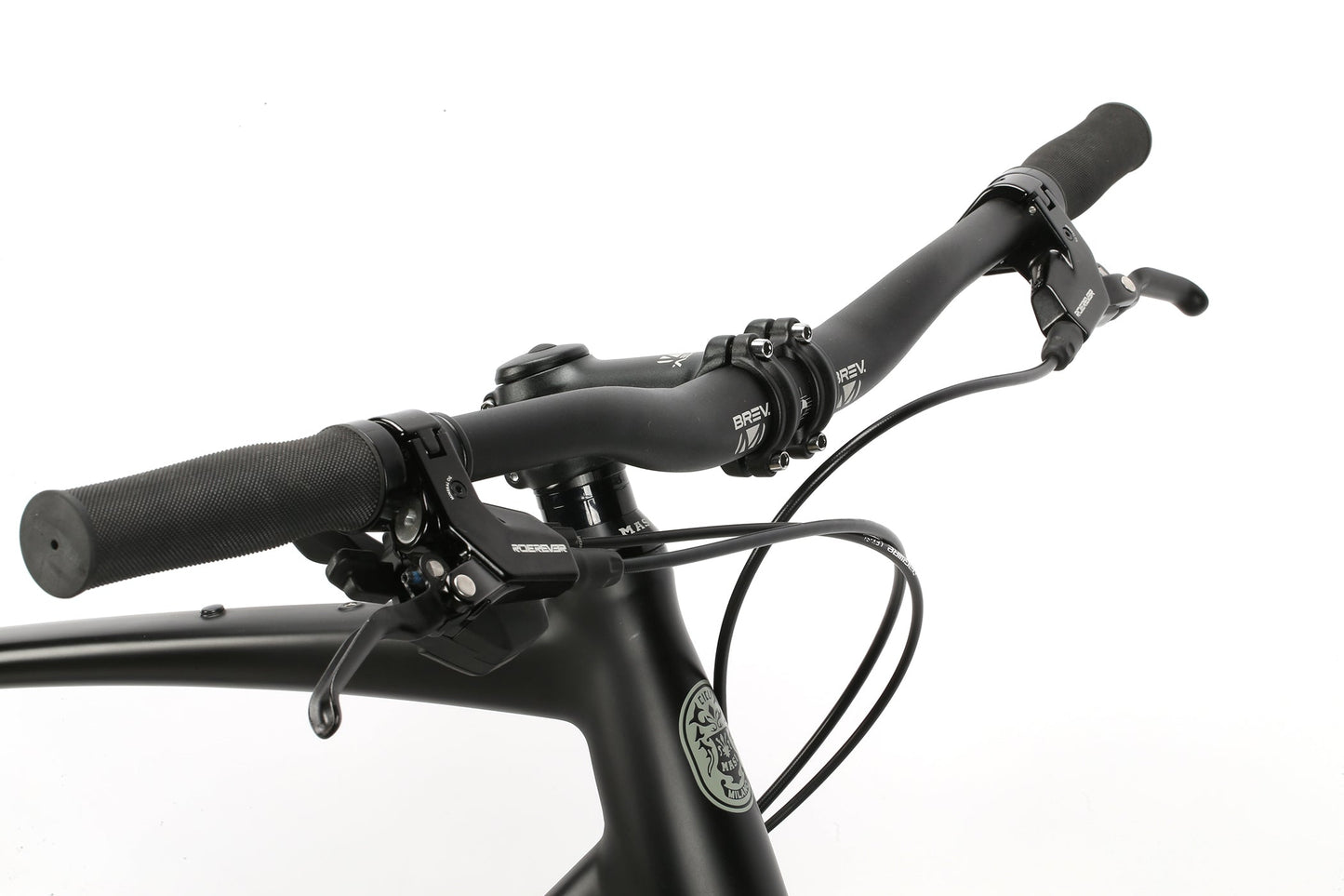 Close-up of BRUNELLO FB NOVEs handlebars and brake levers with an aluminum gravel frame against a white background.