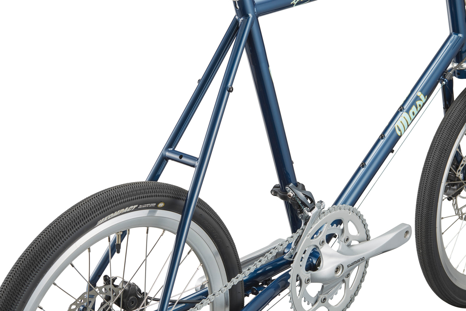 Close-up of the STELVIO 1: blue MiniVelo frame, rear wheel, pedals, and chainring—urban-ready with detailed tubing.