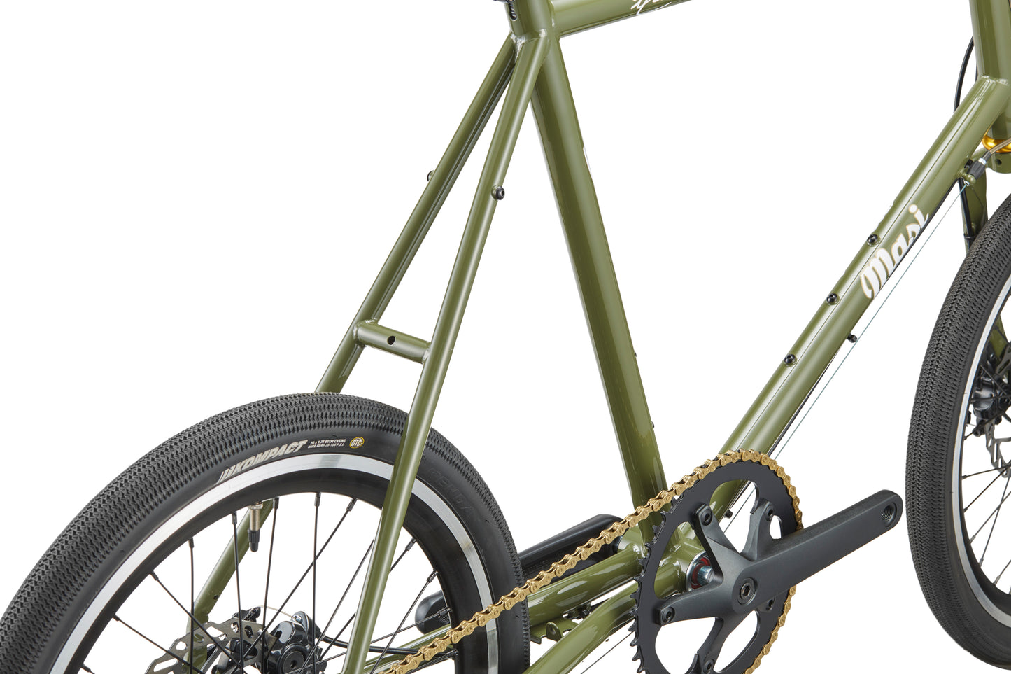 Close-up of the STELVIO 2 MiniVelo frame, highlighting the rear wheel, chain, pedals, and crankset against a white background.