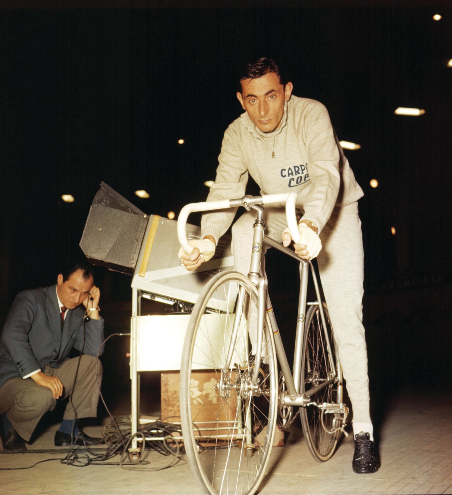 Coppi sitting on his Masi bicycle