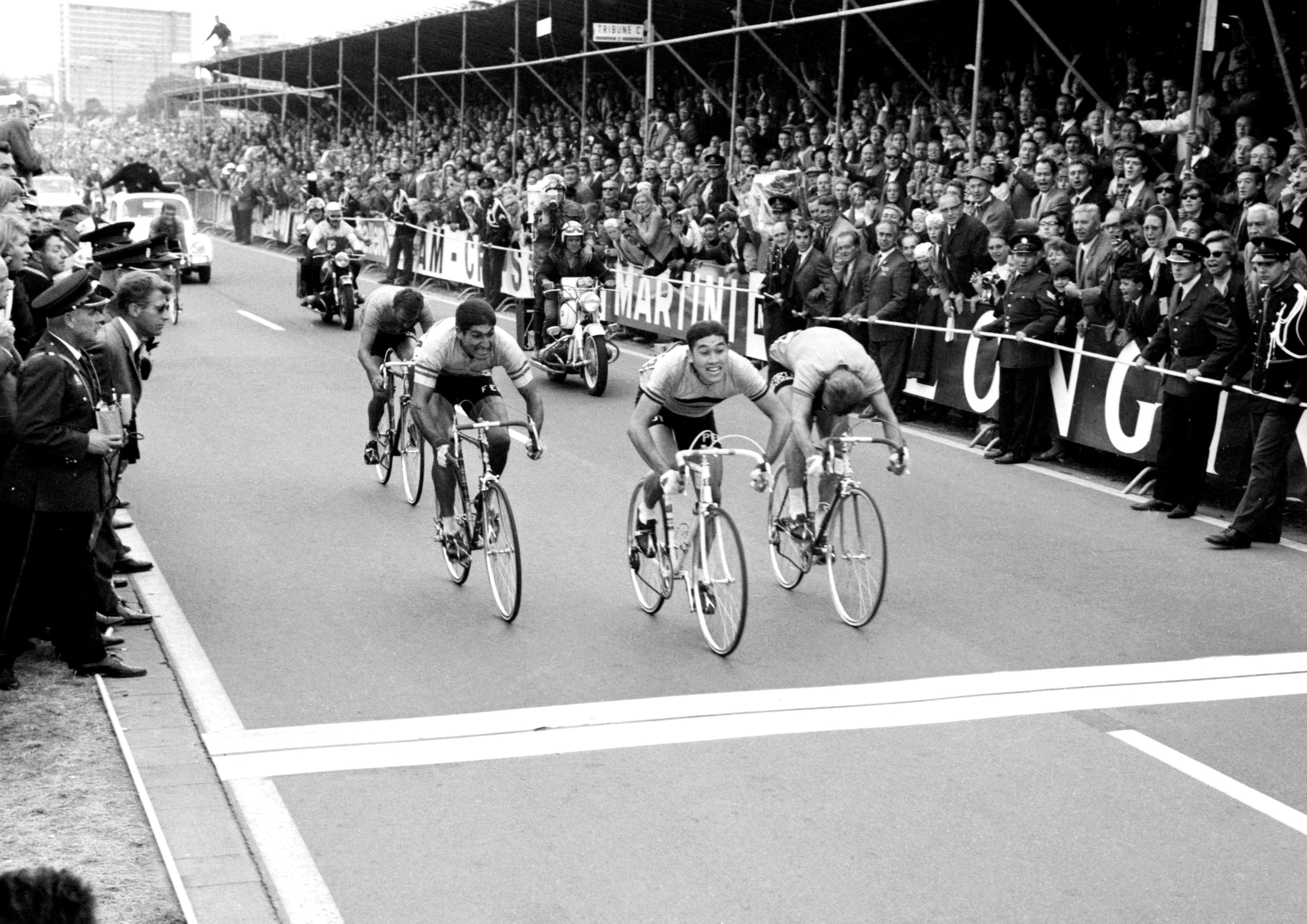 Group of bicycle riders near the finish line