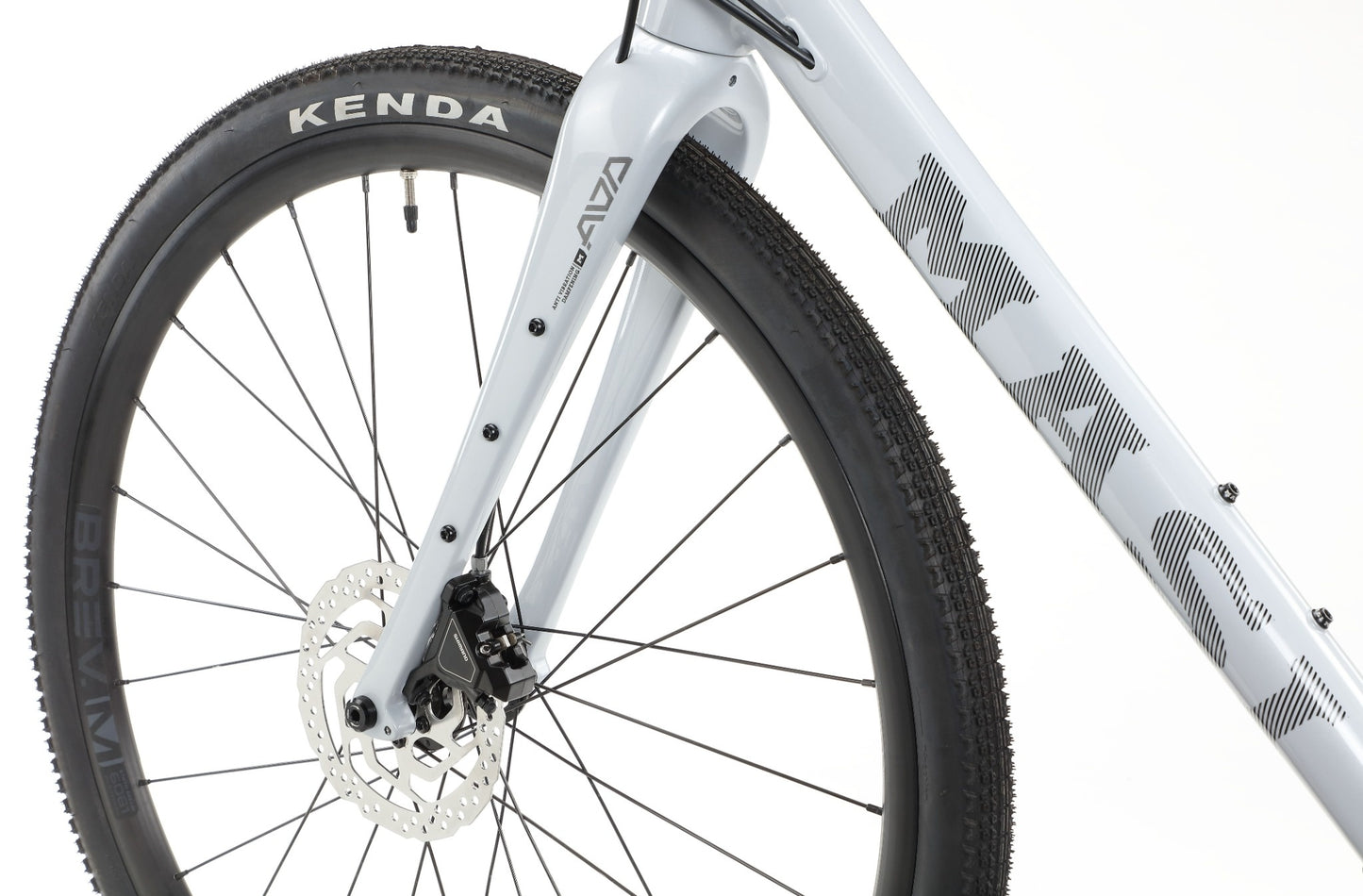 Close-up of BRUNELLO 3’s front wheel and fork, showing disc brake, tubeless-ready wheels, and MASH logo on the alloy frame.