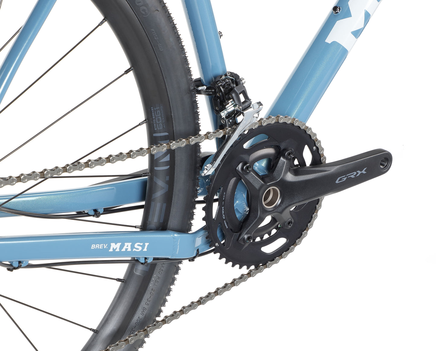 Close-up of a blue BRUNELLO 1’s rear wheel, chain, GRX crankset, and BREV MASI on the frame.