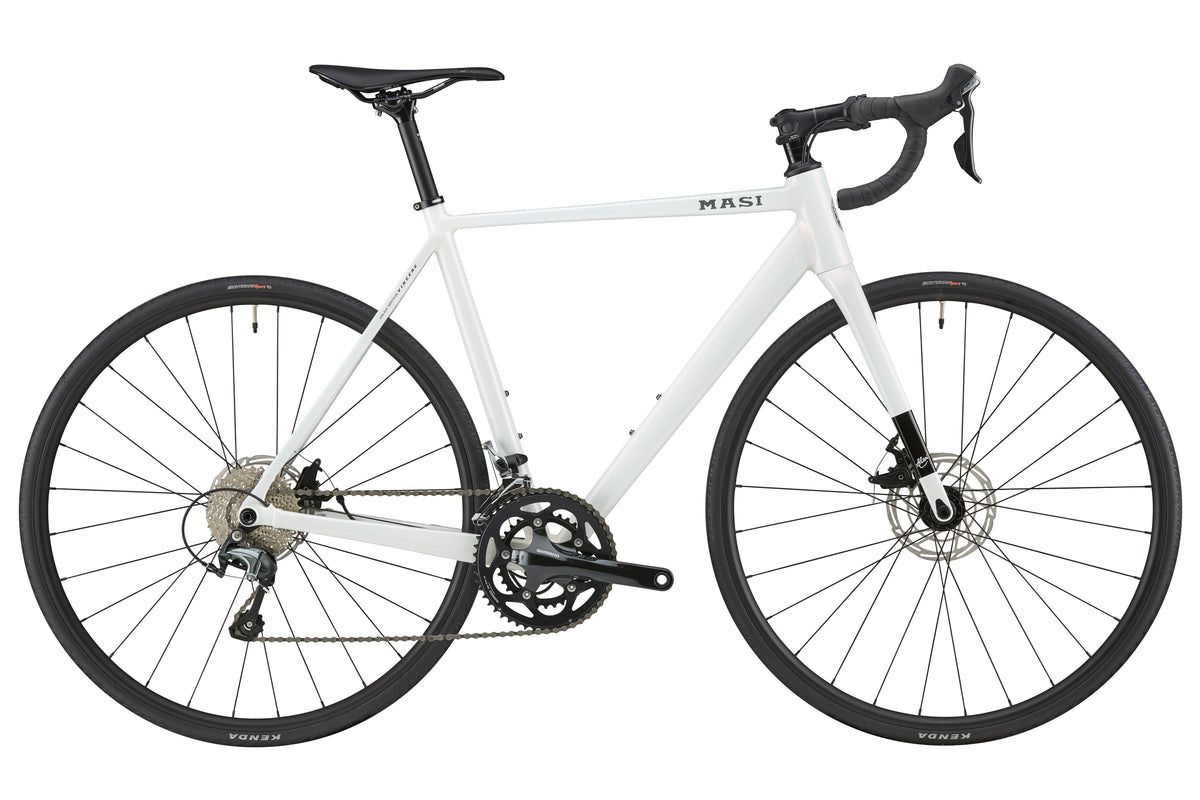 The VINCERE 3 road bike features an alloy frame, drop handlebars, thin tires, disc brakes, and a black seat with details.