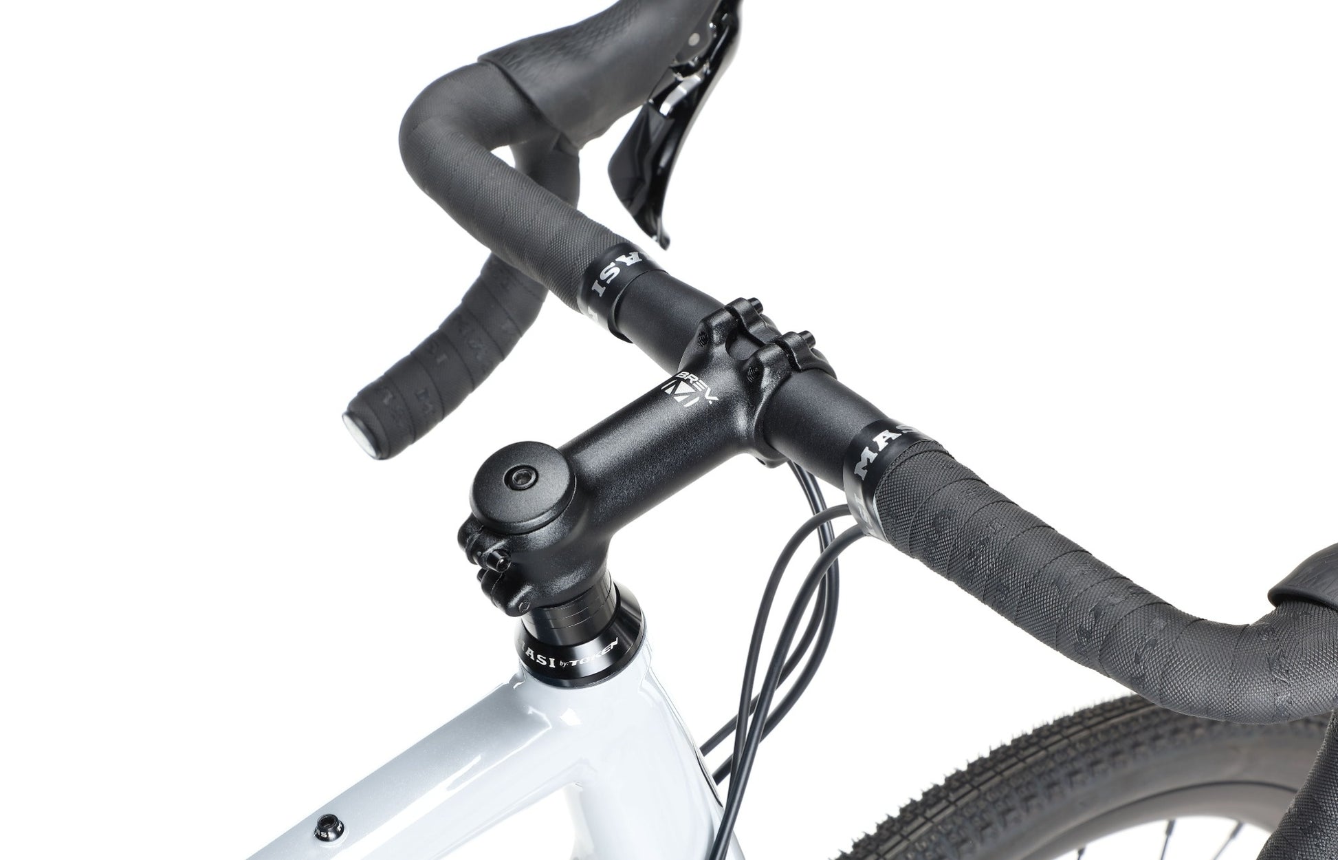 Close-up of BRUNELLO 1s black drop handlebars, stem, and front brake cables on a lightweight alloy frame against white background.